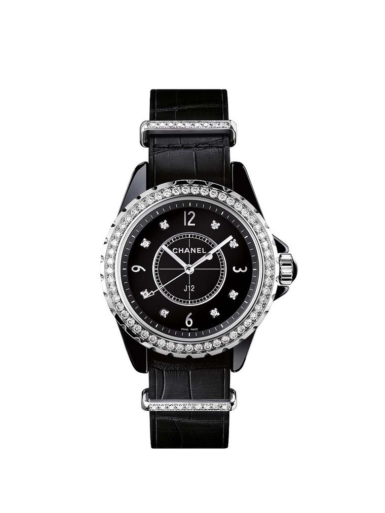 Chanel J12-G10 watch in 33mm black ceramic. The original J12 watch was conceived by Chanel's famous artistic director as a watch for men. Jacques Helleu wanted to recreate the inky black colour of Coco Chanel's lacquered tables and found a solution in bla